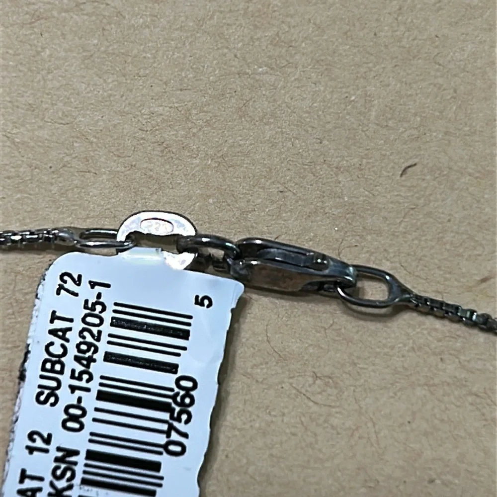 Stylish Silver Cat Charm Necklace with Intricate Details